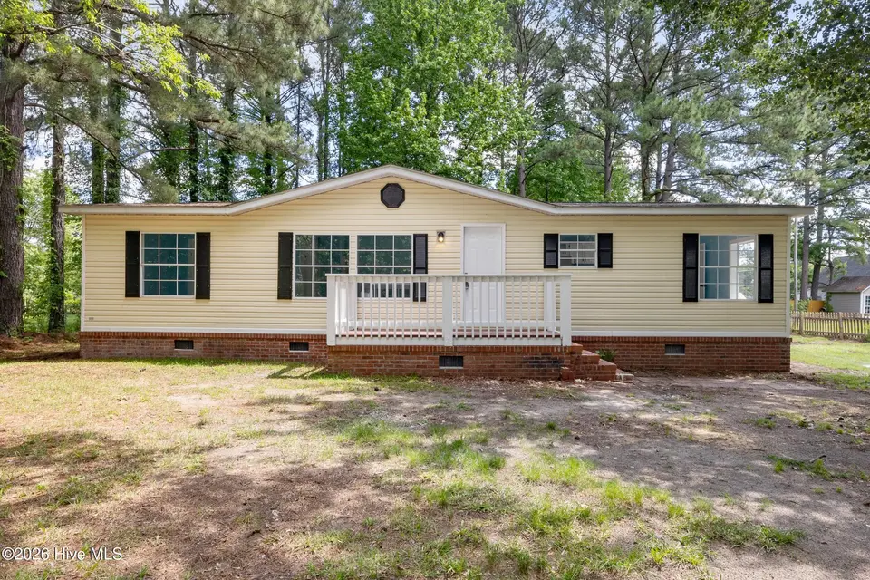 211 Pond Road, Rocky Point, NC 28457 — 3-bedroom manufactured home in Arvida Lands, Rocky Point, NC, photo 1 of 36: 1_front exterior