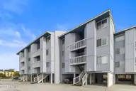 1311 Lake Park Boulevard S 2b, Carolina Beach, NC 28428 — 1-bedroom waterfront condo in Sea Colony, Carolina Beach, NC, photo 2 of 42: Front