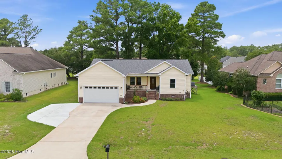 907 Sea Holly Court, New Bern, NC 28560 — 4-bedroom waterfront home in Fairfield Harbour, New Bern, NC, photo 1 of 55: 1-web-or-mls-DJI_20260708145239_0132_D