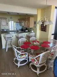 801 Salter Path Road 108, Indian Beach, NC 28512 — 1-bedroom waterfront condo in Windward Dunes, Indian Beach, NC, photo 7 of 12: Dining combo