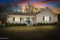925 Pamela Lane, Rocky Mount, NC 27803 — 3-bedroom home in Maplewood, Rocky Mount, NC, photo 1 of 37: Twilight Front Exterior