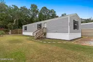 3664 Lakeview Drive SW, Supply, NC 28462 — 2-bedroom manufactured home in Lakeview Of Windy Pt, Supply, NC, photo 1 of 16: 3664 Lakeview Dr SW