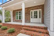 284 Longleaf Drive, West End, NC 27376 — 5-bedroom home in Seven Lakes West, West End, NC, photo 2 of 39: Front Porch