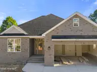 216 Ravennaside Drive NW, Calabash, NC 28467 — 3-bedroom home in Brunswick Plantation, Calabash, NC, photo 2 of 60: 1-custom-DJI_20260519082019_0003_D_MAVIC