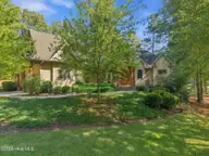 70 Royal Dublin Downs, Pinehurst, NC 28374 — 4-bedroom waterfront home in National, Pinehurst, NC, photo 1 of 53: 70 Royal Dublin Dr