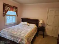 528 Ole Farm Trail, Whiteville, NC 28472 — 4-bedroom home in Runnymeade, Whiteville, NC, photo 15 of 32: Bedroom 2