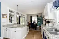 213 Creek View Circle, Sneads Ferry, NC 28460 — 4-bedroom waterfront home in Creeks Edge, Sneads Ferry, NC, photo 18 of 51: e kitchen:dining 1
