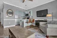 106 N Water Street 907, Wilmington, NC 28401 — 1-bedroom condo in Water Street Center Condo, Wilmington, NC, photo 10 of 34: Living Room - Kitchen