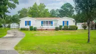 1076 Clubview Lane SW, Calabash, NC 28467 — 3-bedroom manufactured home in Village At Calabash, Calabash, NC, photo 1 of 23
