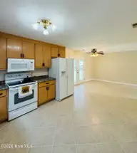 820 Cedar Point Circle, Elizabeth City, NC 27909 — 3-bedroom home in Briarwood, Elizabeth City, NC, photo 8 of 29: Kitchen to Dining