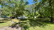 648 Old Church Road, Swansboro, NC 28584 — 3-bedroom manufactured home in Cedar Creek Est, Swansboro, NC, photo 10 of 37: storage/workshop