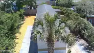 133 Myrtle Avenue, Kure Beach, NC 28449 — 3-bedroom manufactured home in Hanby Beach, Kure Beach, NC, photo 1 of 27: Drone 1