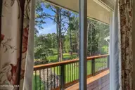 22 Pine Lake Drive, Whispering Pines, NC 28327 — 3-bedroom waterfront home in Pine Lakes, Whispering Pines, NC, photo 12 of 53: Wake up to this view
