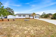 304 NE 50th Street, Oak Island, NC 28465 — 3-bedroom home, Oak Island, NC, photo 1 of 46