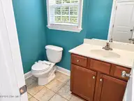 776 Jim Grant Avenue, Sneads Ferry, NC 28460 — 3-bedroom home in Grantwood, Sneads Ferry, NC, photo 7 of 20: JG half bath