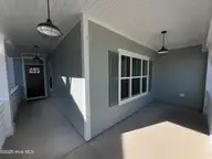 117 Flat Clam Drive, Wilmington, NC 28401 — 3-bedroom home in Riverside Cove, Wilmington, NC, photo 5 of 28: Front Porch