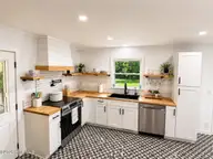 34 Holland Drive, Castle Hayne, NC 28429 — 3-bedroom home in Wrightsboro Acres, Castle Hayne, NC, photo 2 of 22: kitchen3