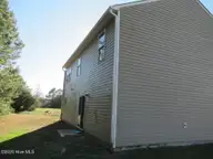 2100 Deerwood Lane, Kinston, NC 28504 — 4-bedroom home in Dogwood Creek, Kinston, NC, photo 4 of 18: 3 REAR