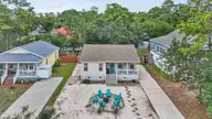 316 NE 52nd Street, Oak Island, NC 28465 — 3-bedroom home in Tranquil Harbor, Oak Island, NC, photo 11 of 49: 3_drone