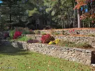 25 Firestone Lane, Pinehurst, NC 28374 — 3-bedroom home in Unit 1, Pinehurst, NC, photo 18 of 23: yard1