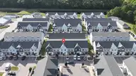 417 Sunfish Lane, Sneads Ferry, NC 28460 — 3-bedroom townhome in Beachside Commons, Sneads Ferry, NC, photo 3 of 41: DJI_20260921170604_0058_D