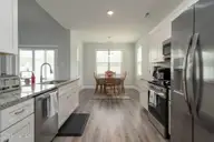 610 Bright Harvest Drive, Maysville, NC 28555 — 3-bedroom home in Batchelors Cove, Maysville, NC, photo 13 of 33: Kitchen to Dining Nook