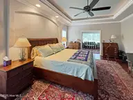 6003 Mount Carmel Parke, Wilmington, NC 28412 — 4-bedroom home in Village at Motts Landing, Wilmington, NC, photo 12 of 72: Motts_PrimaryBed