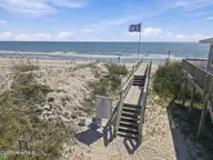 1305 N Shore Drive, Surf City, NC 28445 — 3-bedroom home in Del Mar Beach, Surf City, NC, photo 3 of 46: 16-web-or-mls-DJI_20261014121749_0017_D