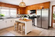19 Wilkins Road, Belhaven, NC 27810 — 4-bedroom home, Belhaven, NC, photo 17 of 61: Furnished Kitchen AI Generated