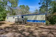 409 Pond View Circle, Hampstead, NC 28443 — 3-bedroom manufactured home in Virginia Creek Forest, Hampstead, NC, photo 1 of 30