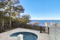 3804 Emerald Drive W, Emerald Isle, NC 28594 — 4-bedroom waterfront townhome in Emerald Isle By The Sea, Emerald Isle, NC, photo 11 of 46: Pool overlooking water