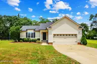 124 Dobbs County Courthouse Road, La Grange, NC 28551 — 3-bedroom home in Dobbs County Estates, La Grange, NC, photo 1 of 32: 01-124 Dobbs County Court House Rd-front
