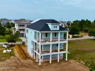 102 Marshland Circle, Newport, NC 28570 — 4-bedroom waterfront home in Cannonsgate, Newport, NC, photo 7 of 19: Rear Elevation