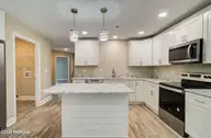 2044 N Tanglewood Drive SW, Supply, NC 28462 — 3-bedroom home in Fairwood, Supply, NC, photo 11 of 33: 3_2 Tandem Kitchen