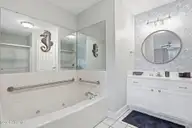 908 Resort Circle Unit 510, Sunset Beach, NC 28468 — 1-bedroom condo in Colony II, Sunset Beach, NC, photo 16 of 30: Jetted, jacuzzi tub