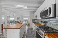 5127 W Beach Drive, Oak Island, NC 28465 — 5-bedroom waterfront home, Oak Island, NC, photo 7 of 73: 38_kitchen
