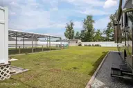 705 Plowshare Court, Maysville, NC 28555 — 3-bedroom home in Batchelors Cove, Maysville, NC, photo 23 of 36: Backyard from RV Side