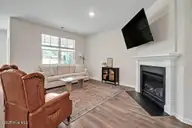 1325 Clendon Circle, Leland, NC 28451 — 3-bedroom home in Brunswick Forest, Leland, NC, photo 10 of 56: Living Room - Gas log fireplace