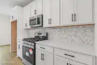 4212 Workman Loop 95, Leland, NC 28451 — 4-bedroom home in East Lake, Leland, NC, photo 8 of 28: Similar - Kitchen