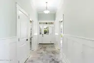 1454 Dunes Boulevard SW, Ocean Isle Beach, NC 28469 — 4-bedroom home in Retreat At OIB, Ocean Isle Beach, NC, photo 5 of 52: Foyer- flooring has been removed