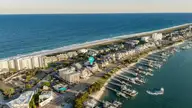 110 Waynick Boulevard, Wrightsville Beach, NC 28480 — 4-bedroom waterfront home, Wrightsville Beach, NC, photo 8 of 77: 005_dji_20260504192100_0439_d_975