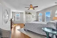 6707 Kings Lynn Drive, Oak Island, NC 28465 — 3-bedroom waterfront home in Kings Lynn, Oak Island, NC, photo 22 of 51: master 4