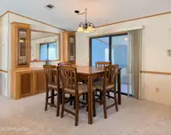 719 Nautical Court, Hampstead, NC 28443 — 2-bedroom manufactured home in Topsail Greens, Hampstead, NC, photo 10 of 58: 18D3CDF3-449E-4EB2-83A9-AA4F3C378047