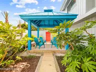 2604 S Shore Drive, Surf City, NC 28445 — 4-bedroom waterfront home in Channelbend, Surf City, NC, photo 10 of 73: Courtyard