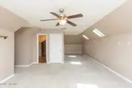 112 Shady Wood Court, West End, NC 27376 — 3-bedroom home in Seven Lakes North, West End, NC, photo 21 of 36: upper bonus-rec room1
