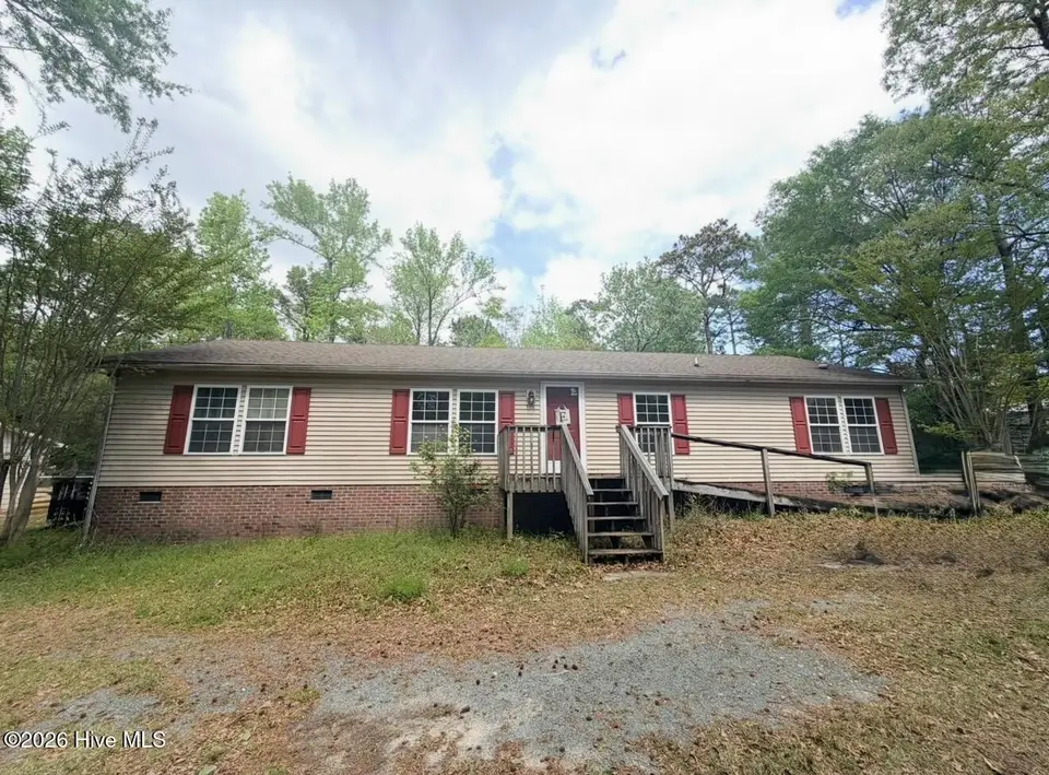 100 N Burning Tree Drive, Hampstead, NC 28443 — 3-bedroom waterfront manufactured home in Groves Point, Hampstead, NC, photo 1 of 1