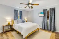 426 Trott Street, Oak Island, NC 28465 — 3-bedroom home in Yaupon Beach, Oak Island, NC, photo 13 of 27: Primary Bedroom