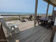 1103 Ocean Drive E & W, Emerald Isle, NC 28594 — 6-bedroom waterfront home, Emerald Isle, NC, photo 7 of 65: ocean front deck