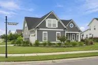 210 Knots Bend Drive, Hampstead, NC 28443 — 4-bedroom home in Salters Haven at Lea Marina, Hampstead, NC, photo 6 of 72: 3_front left exterior