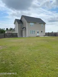 309 Basil Court, Hubert, NC 28539 — 3-bedroom home in Sagewood, Hubert, NC, photo 22 of 27: 309 basil rear L